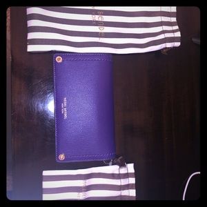 Purple clutch with strap purse/wallet